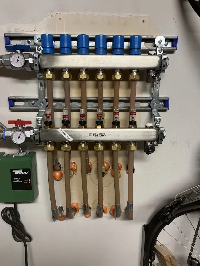 Plumber performing Gas Line Installation at a residential property in Connersville